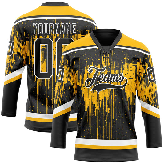 Custom Black Gold Steel Gray-White Dripping Splatter Pattern Hockey Lace Neck Jersey - Main View