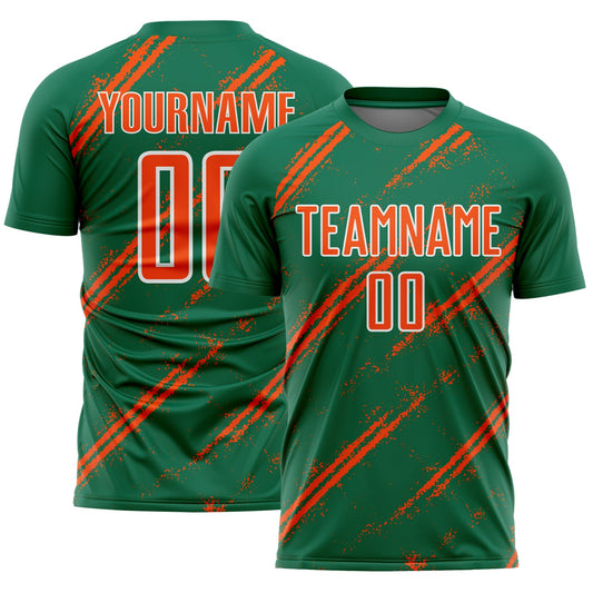 Custom Kelly Green Orange-White Abstract Fragment Art Splash Sublimation Soccer Uniform Jersey - Main View