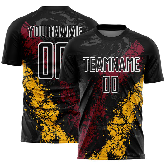 Custom Black White Crimson-Gold Dripping Splatter Cracked Texture Sublimation Soccer Uniform Jersey - Main View