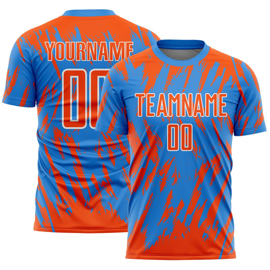 Custom Powder Blue Orange-White Splatter Torn Sharp Brush Stroke Sublimation Soccer Uniform Jersey - Main View