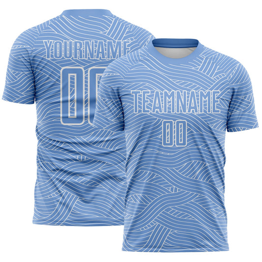 Custom Light Blue-White Abstract Wave Lines Interlocking Sublimation Soccer Uniform Jersey - Main View